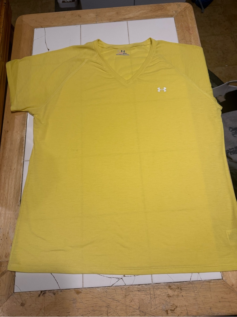 Under Armour women’s  Bright Yellow V-Neck heat gear Performance Tee